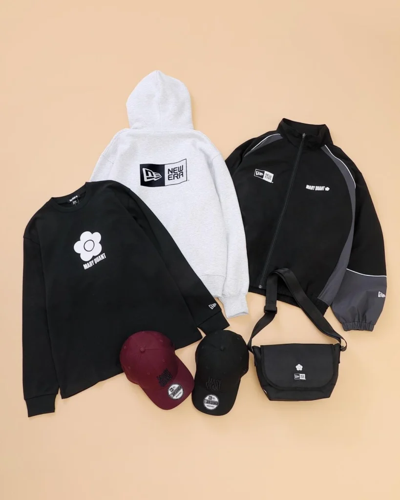 Mary Quant X New Era Apparel, Cap And Bag Collection Arranged On Beige Background