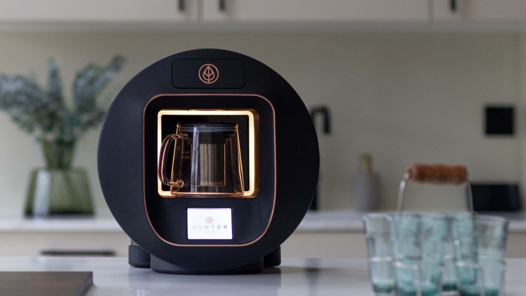 White DOSTEA prototype with glass carafe, shown alongside close-up images of internal tubing, assembly, and fastening detail