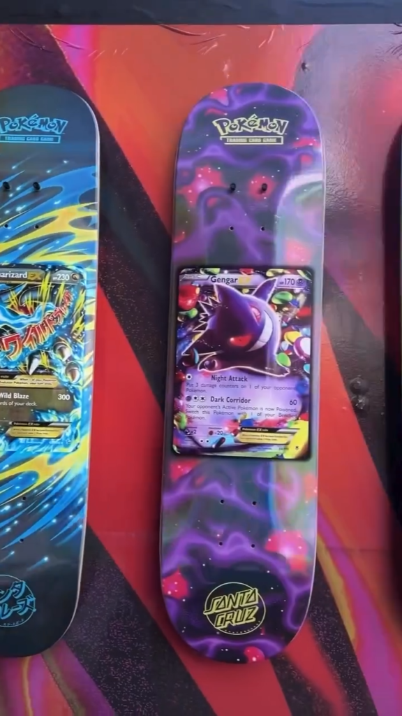 Pokémon-themed Santa Cruz skateboard deck with Gengar artwork and a purple, cosmic background