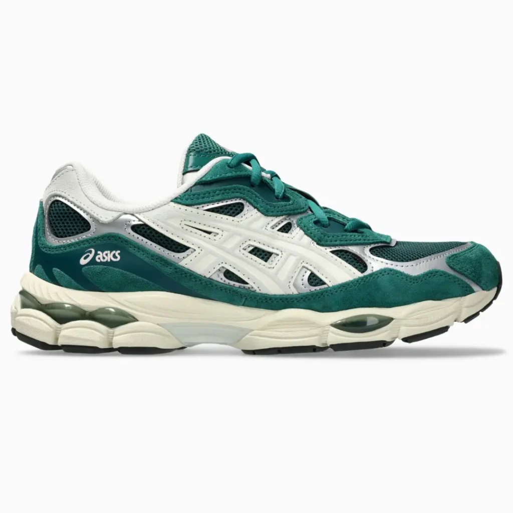 Green and white ASICS running shoe with mesh panels, layered overlays and a cream cushioned sole on a white background