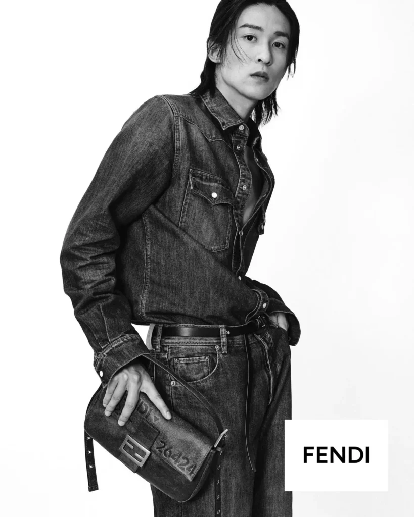 Black-And-White Fendi Campaign With Model In Denim Holding A Leather Baguette Bag