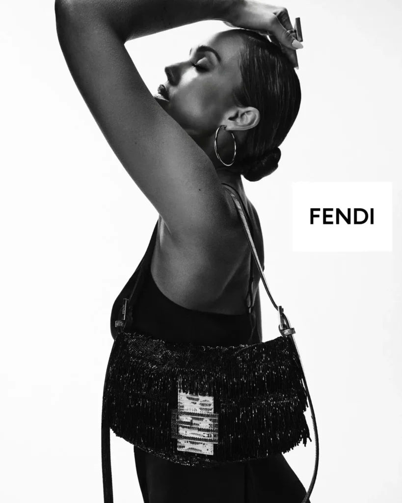 Black-And-White Fendi Portrait With Woman Carrying A Fringed Baguette Bag