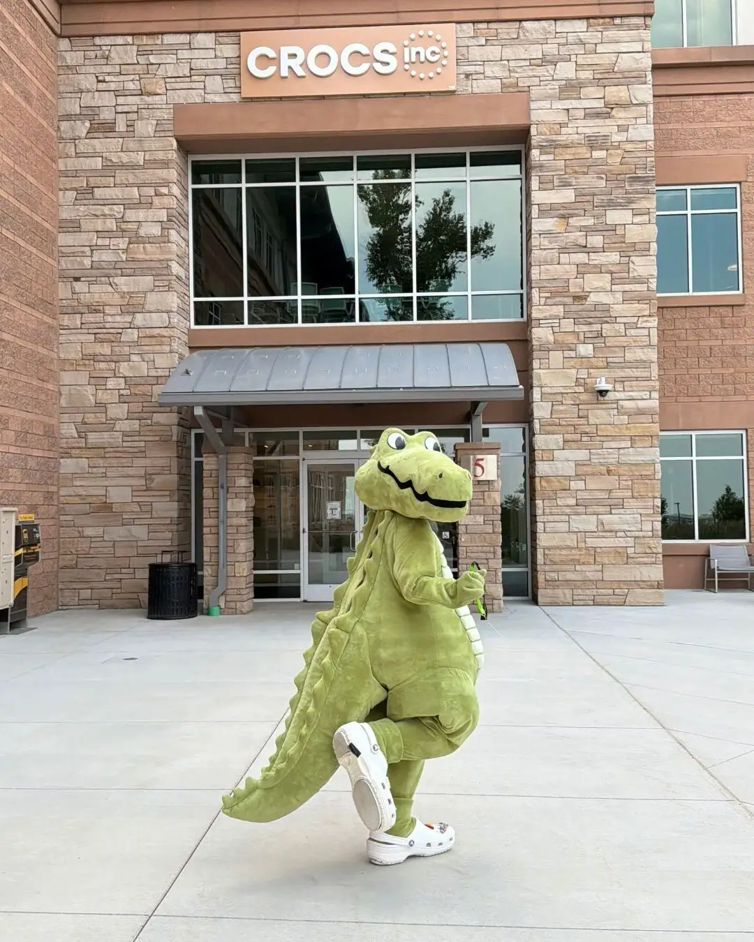 Crocs Mascot Niles Wearing White Crocs Outside The Company Headquarters