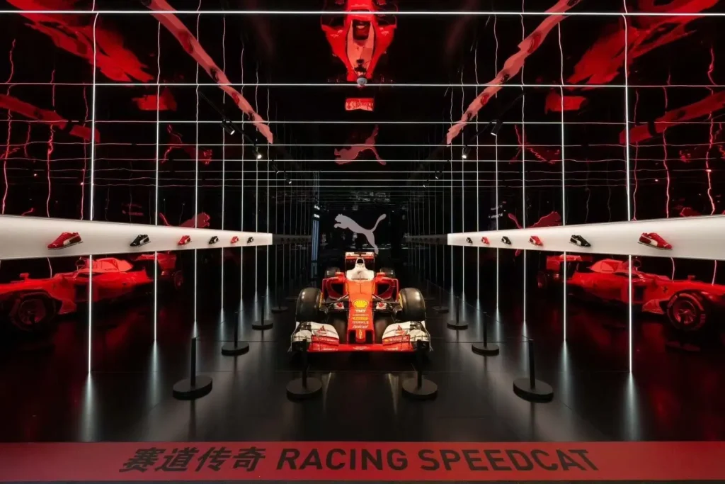 Puma Racing Exhibition With Formula One Car And Footwear Display