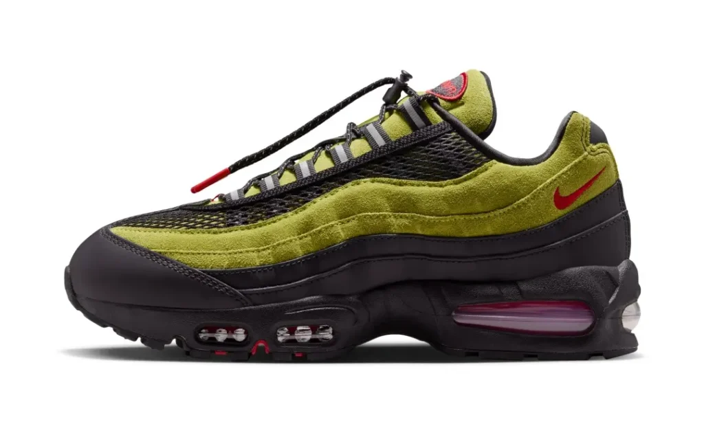 Side profile of the A Ma Maniére x Nike Air Max 95 feature olive suede, black mesh, red Swoosh brand, and visible Air cushion