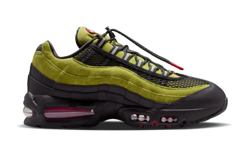 Opposite side profile of the olive and black A Ma Maniére x Nike Air Max 95 with reflective lace loop and red detail