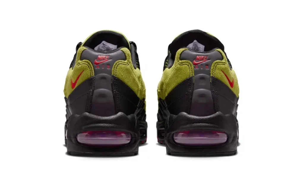 Rear view of the A Ma Maniére x Nike Air Max 95 pair feature olive suede, red Nike Swooshe, Nike Air heel brand, and visible Air unit
