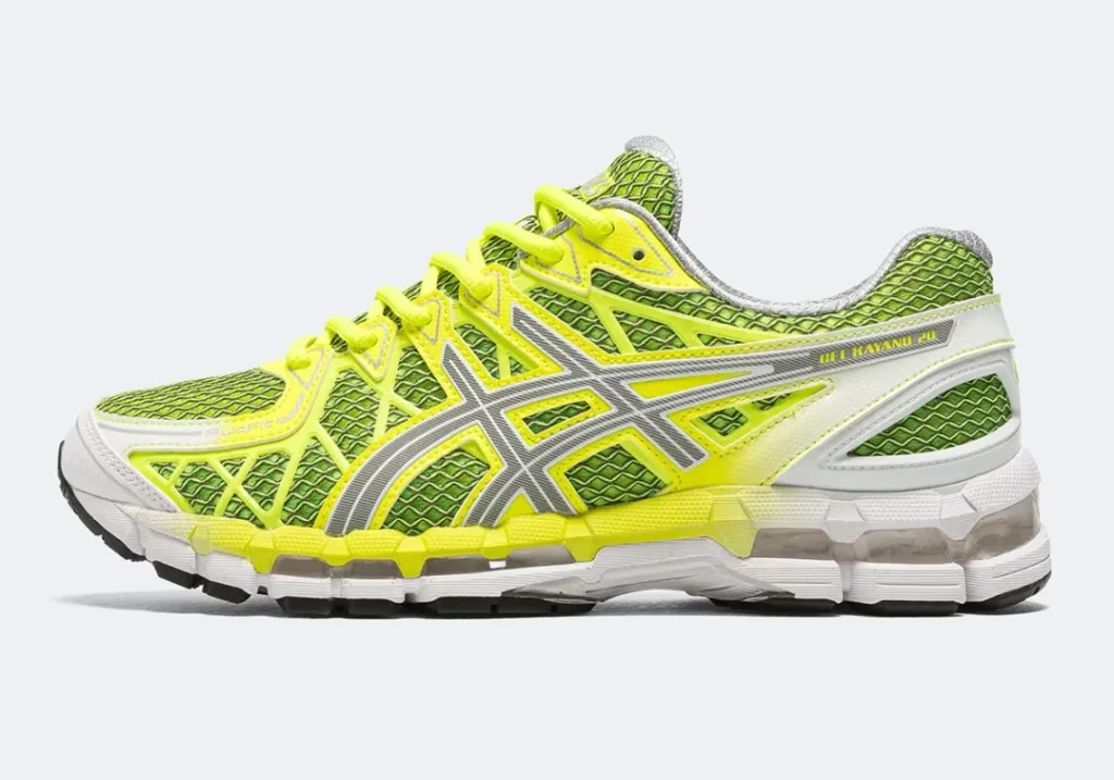 Side profile of the ASICS GEL-Kayano 20 feature green mesh, neon overlay and silver brand