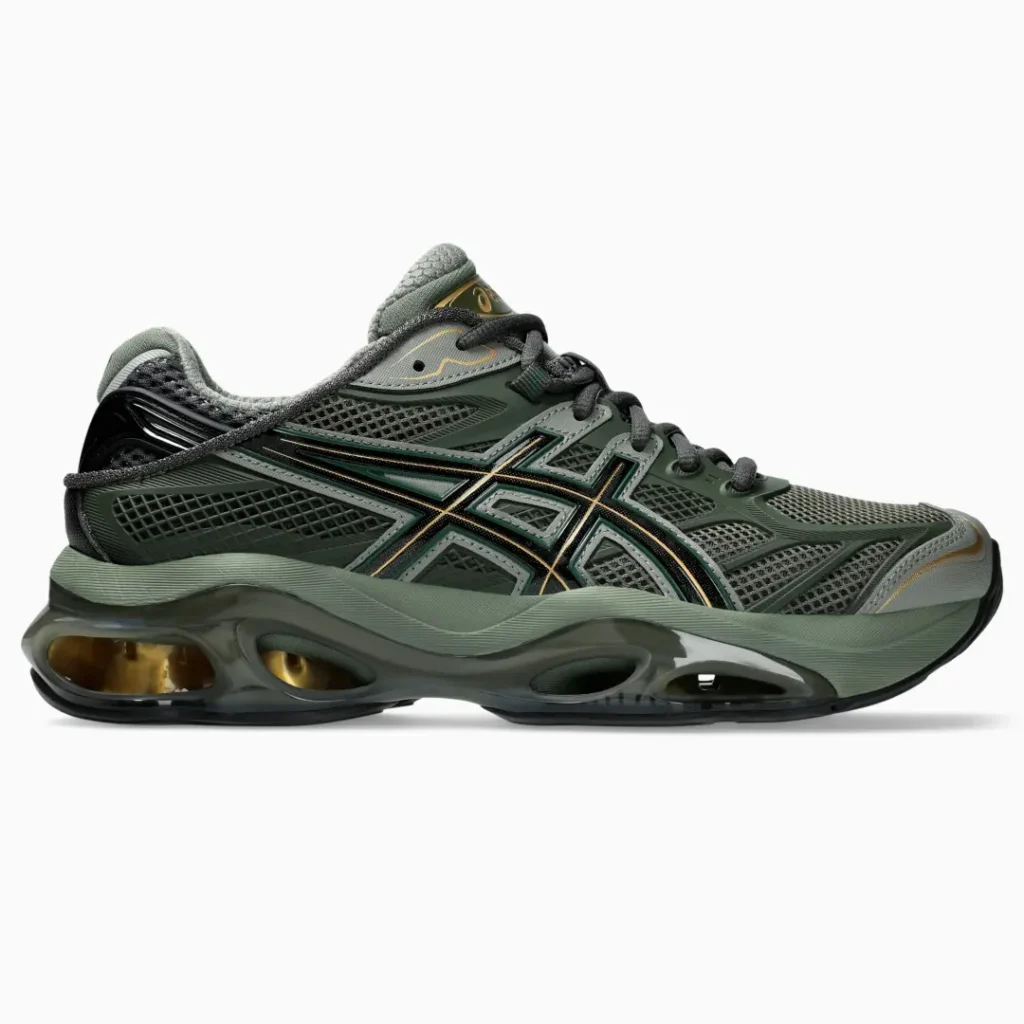 ASICS running shoe in dark olive green with black overlays, breathable mesh upper, gold accent lines, and a sculpt midsole feature oversized view cushion pod
