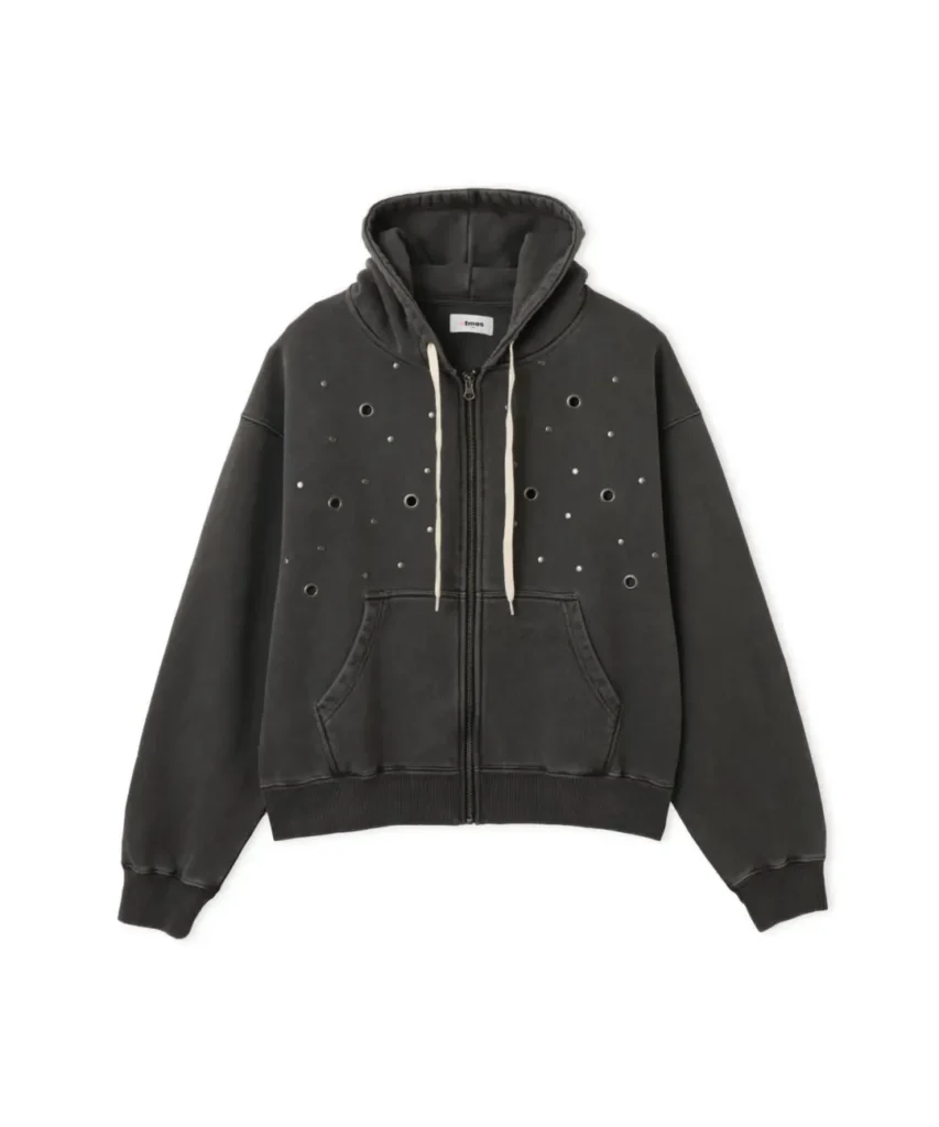 Wash black zip hoodie feature metal eyelet and stud details with cream drawstring