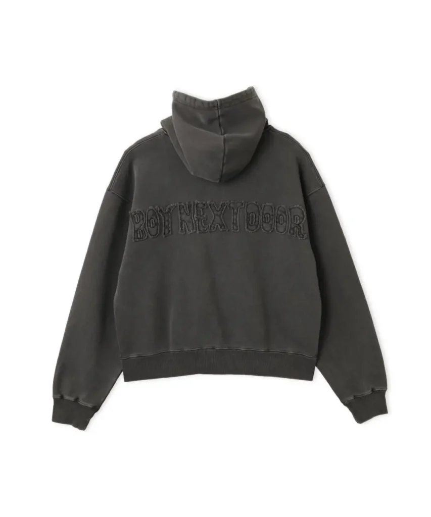 Back of a wash black hoodie feature raise BOYNEXTDOOR letter across the shoulder