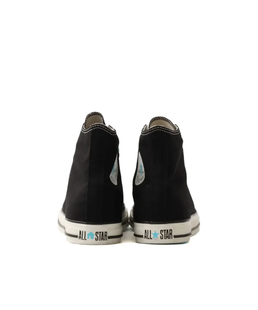 Black Converse high-top pair appears from the rear with collab All Star heel brand