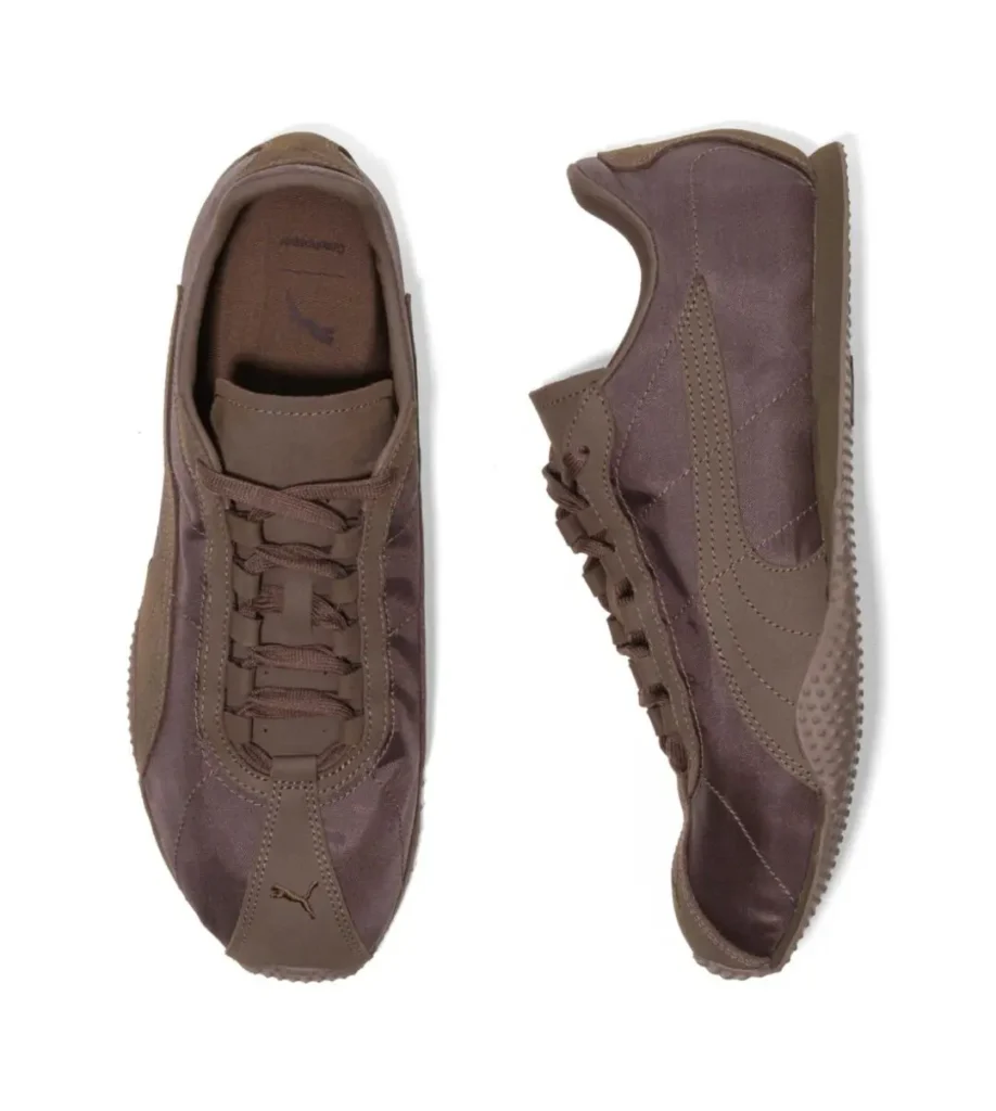 Pair of brown Puma sneakers shown from top and side views on a white background