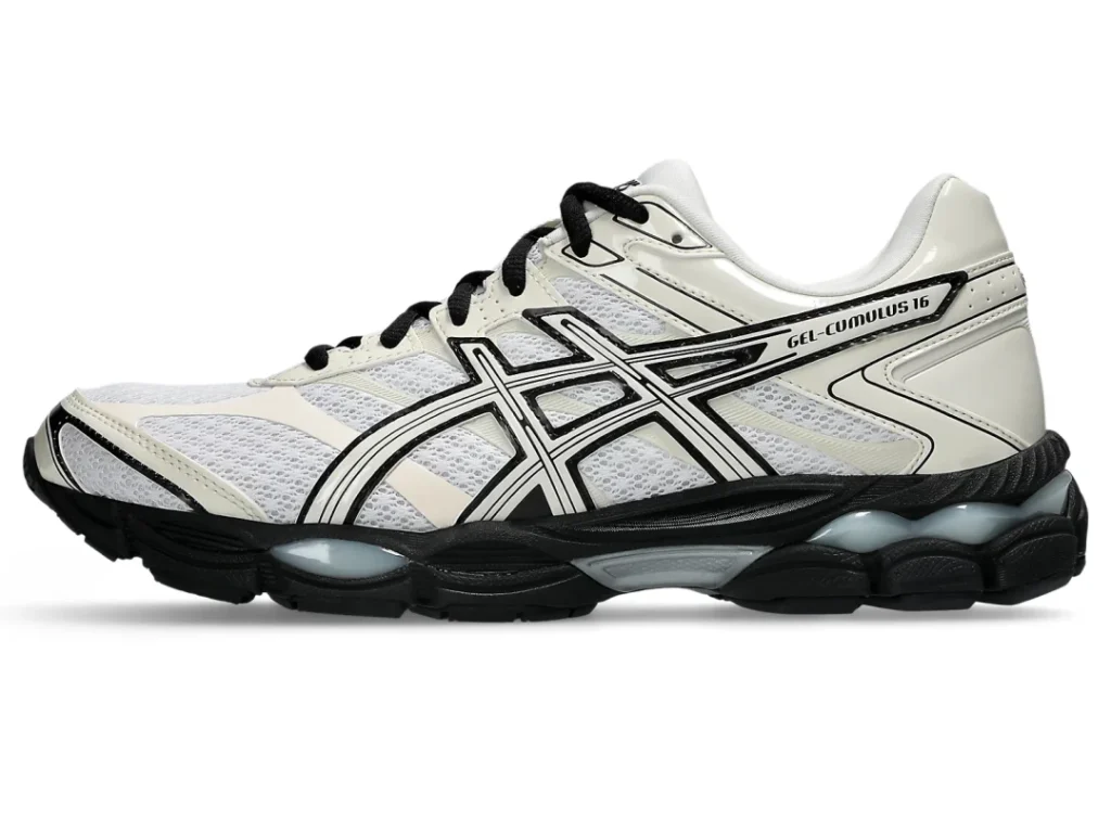 Side profile of the ASICS GEL-CUMULUS 16 displaying the streamlined white mesh upper, black outlined ASICS logo, and segmented GEL-equipped sole