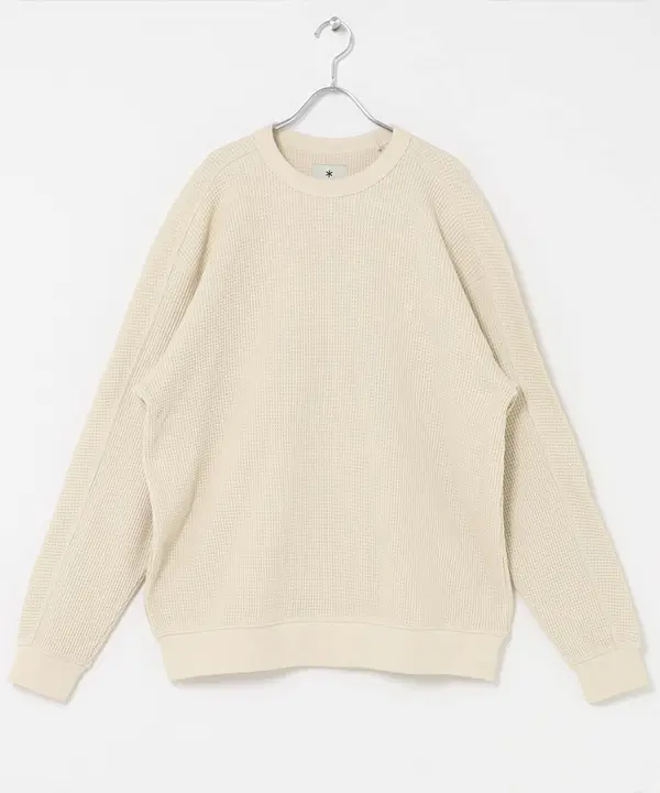 Cream Snow Peak waffle-knit crewneck top displayed on a hanger.