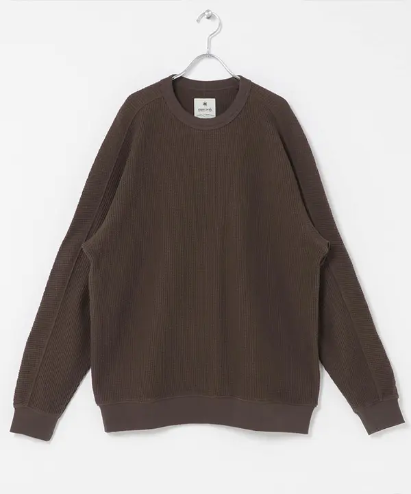 Brown Snow Peak waffle-knit crewneck top displayed on a hanger.