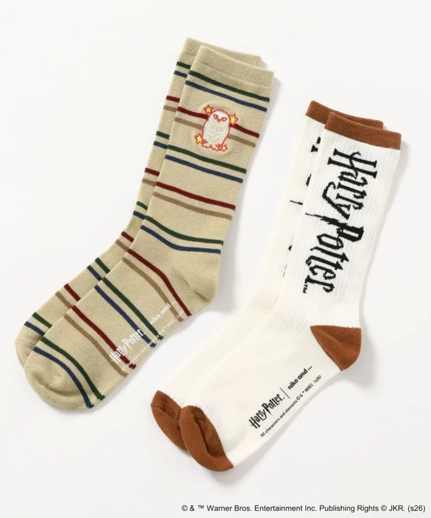 Two pair of Harry Potter sock, include strip Hedwig sock and white logo sock with brown accent