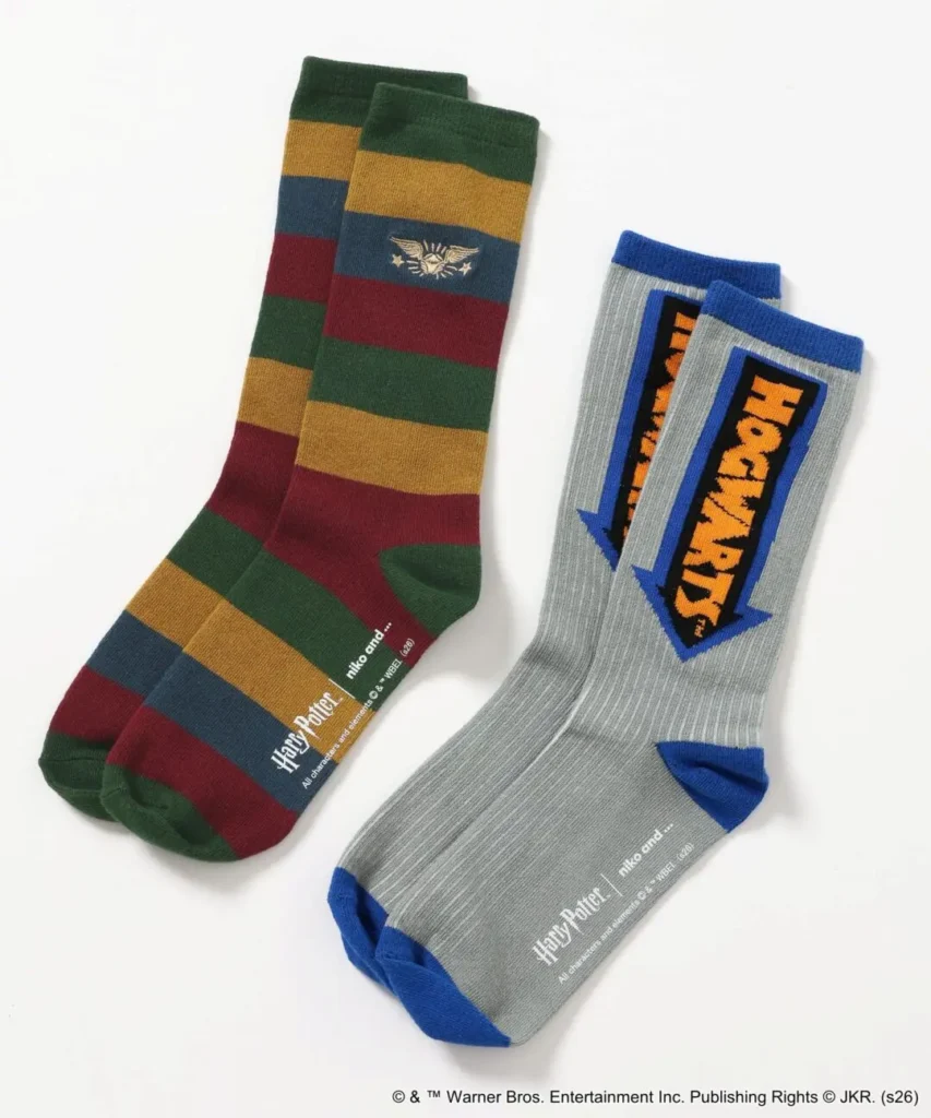 two pair of Harry Potter sock feature multicolor stripe and gray Hogwart logo graphic