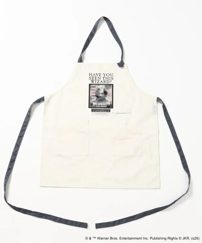 Cream apron feature a “Have You Seen This Wizard?” Sirius Black wanted-poster graphic