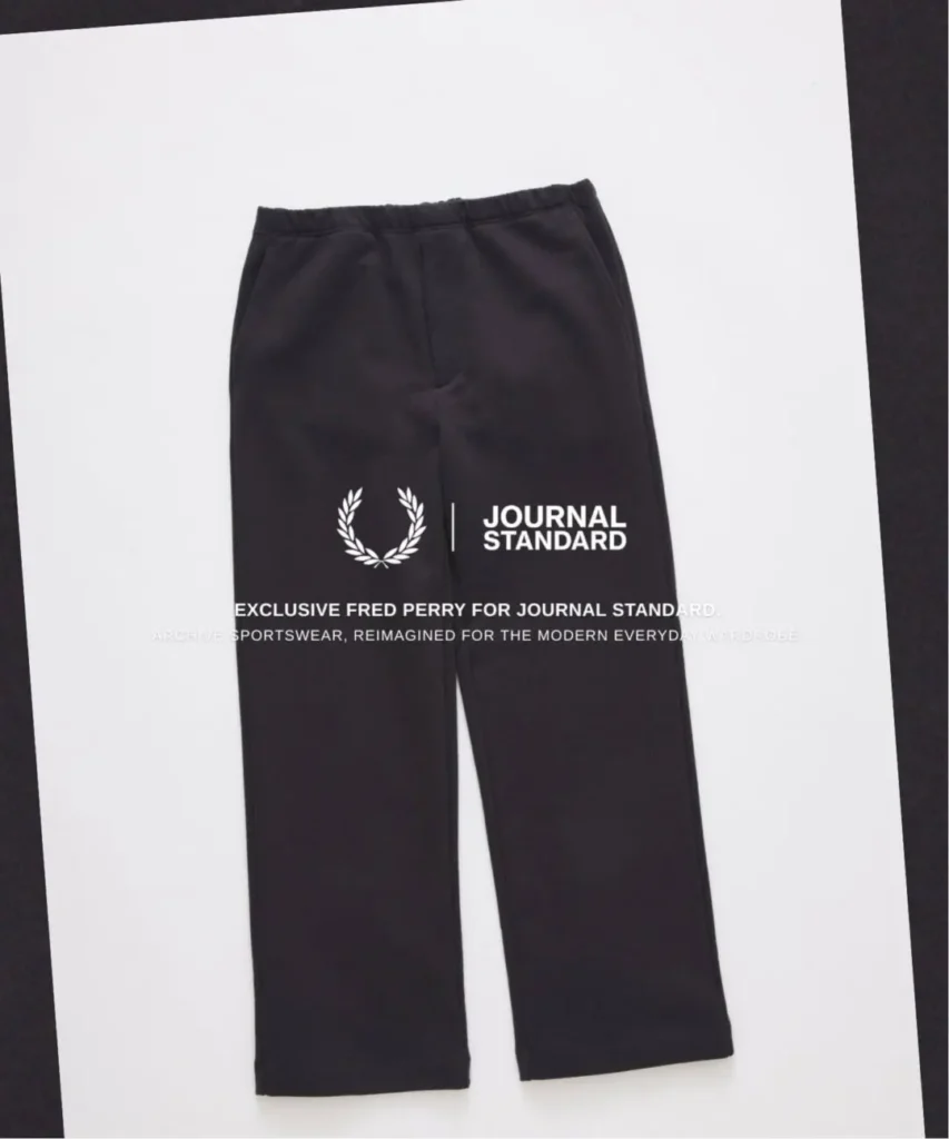 harcoal Fred Perry straight-leg trousers displayed on a white background with JOURNAL STANDARD collide brand