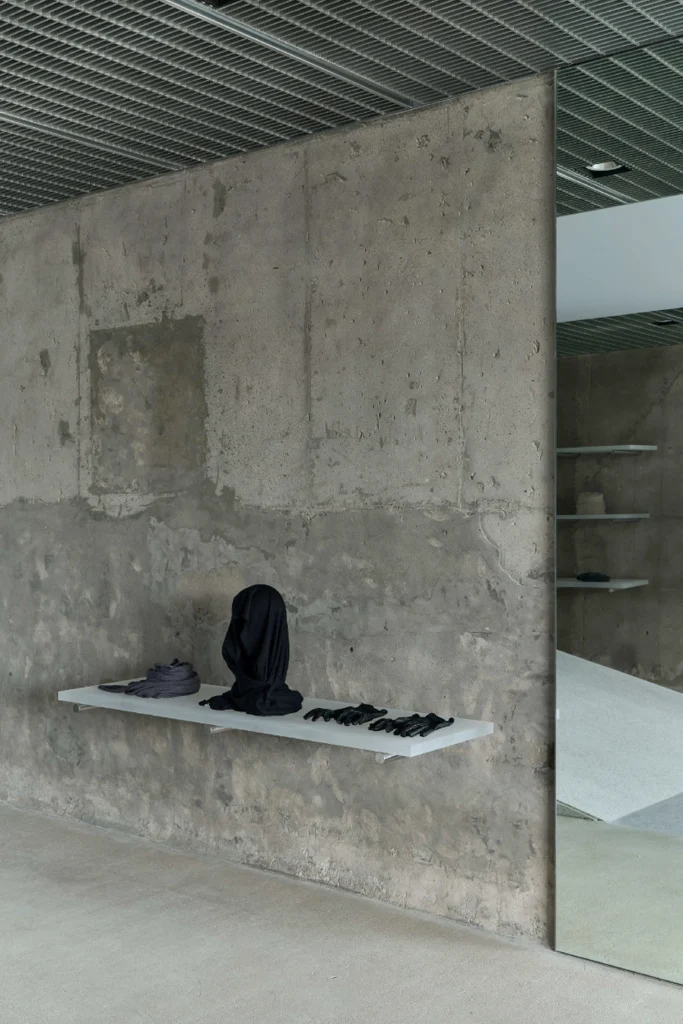 Min Accessory Display With Shoes, Draped Fabric And Gloves On White Shelf