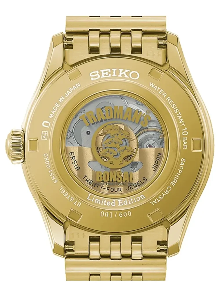 Gold exhibition case back showing Seiko 6R51 movement. "TRADMAN'S BONSAI" logo and "Limited Edition 001/600" engrave