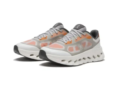Pair Of Gray And Orange On Running Shoe With Translucent Overlay And White Cushion Sole
