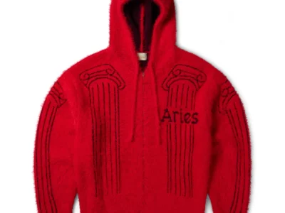Bright red Aries fuzzy zip-up hoodie with black classical column graphics and Aries brand across the front