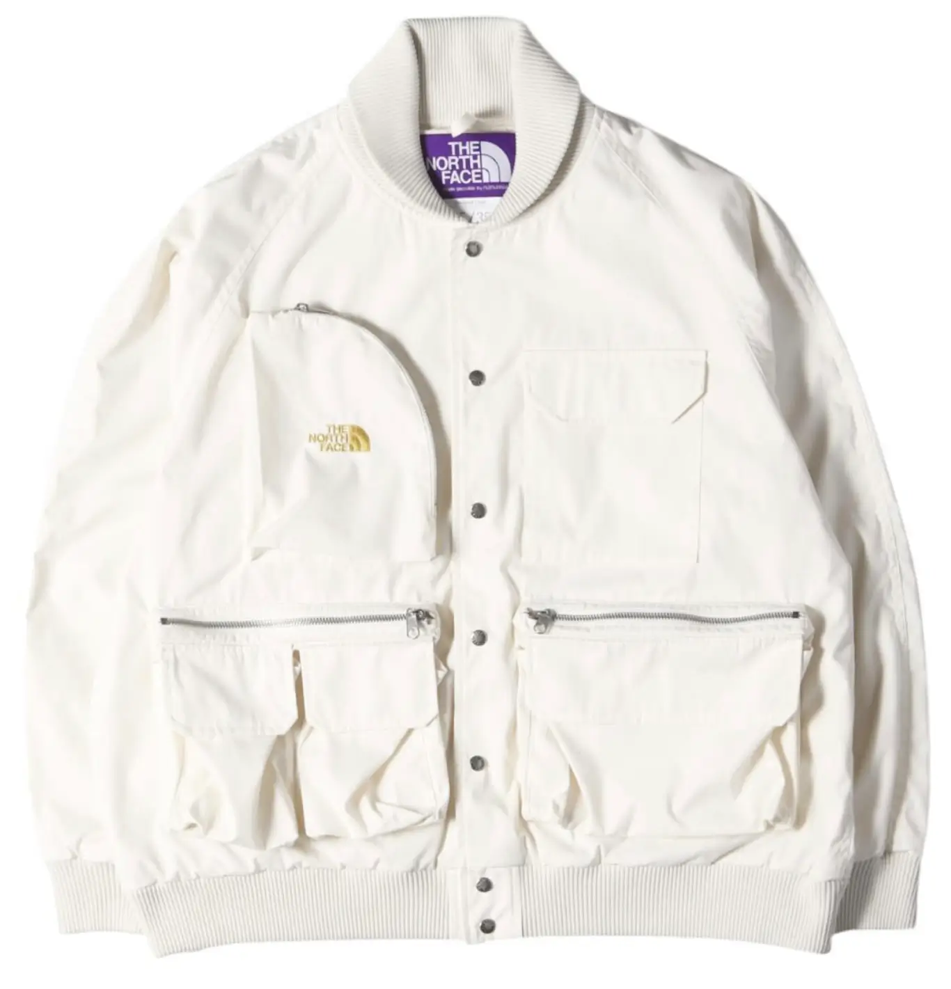White North Face utility jacket with a ribbed collar, snap front, chest pockets, and oversized zippered cargo pockets.