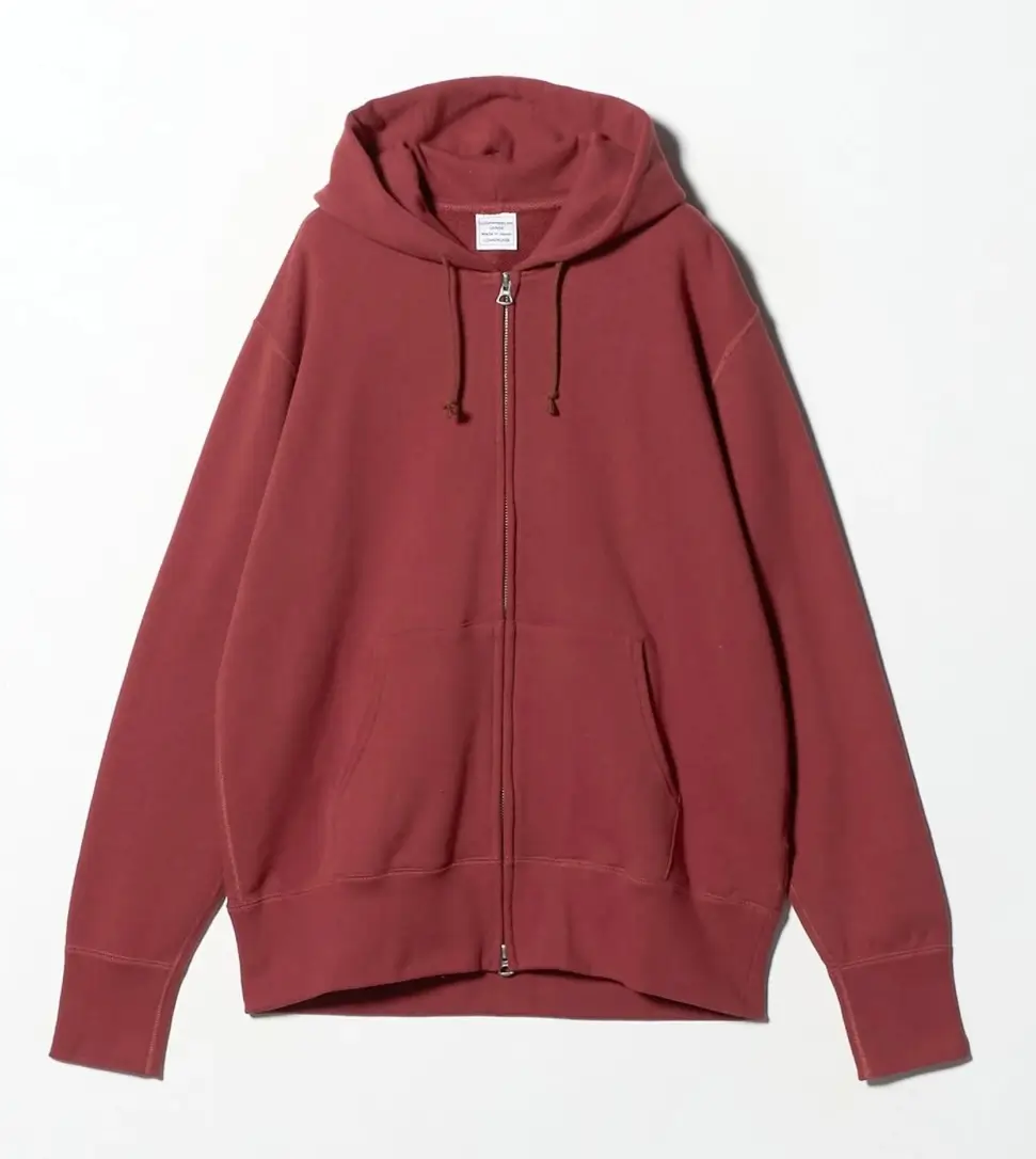 Red LOOPWHEELER full-zip hoodie with drawstring hood, front pockets, and ribbed cuffs and hem.