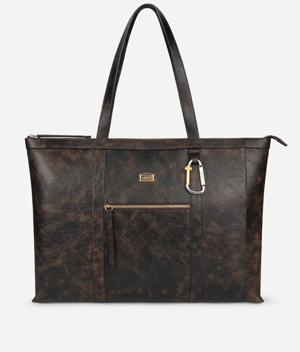Aries dark brown distressed leather tote bag with long shoulder straps, front zip pocket, gold logo plaque and metal carabiner detail.