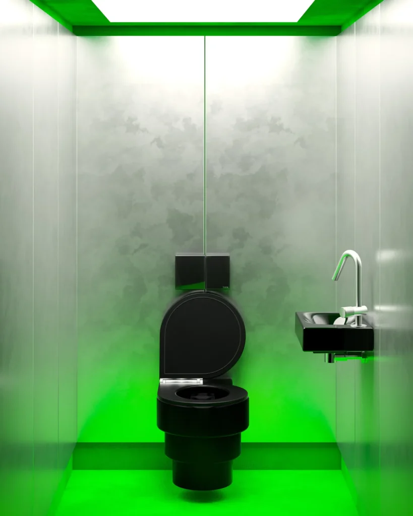 Minimalist bathroom illuminated by vivid green lighting, featuring black fixtures, a floating sink, and softly textured concrete walls beneath a glowing ceiling