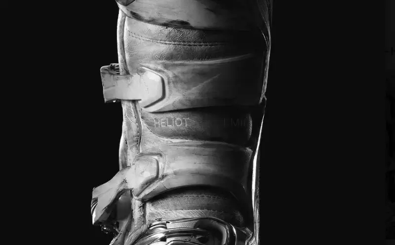 Close-Up Of A Distressed Leather Boot With Buckled Straps And Metallic Hardware
