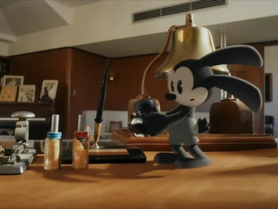 3D Oswald The Lucky Rabbit Hold A Cam On A Desk Surround By Vintage Art Supply And A Brass Lamp