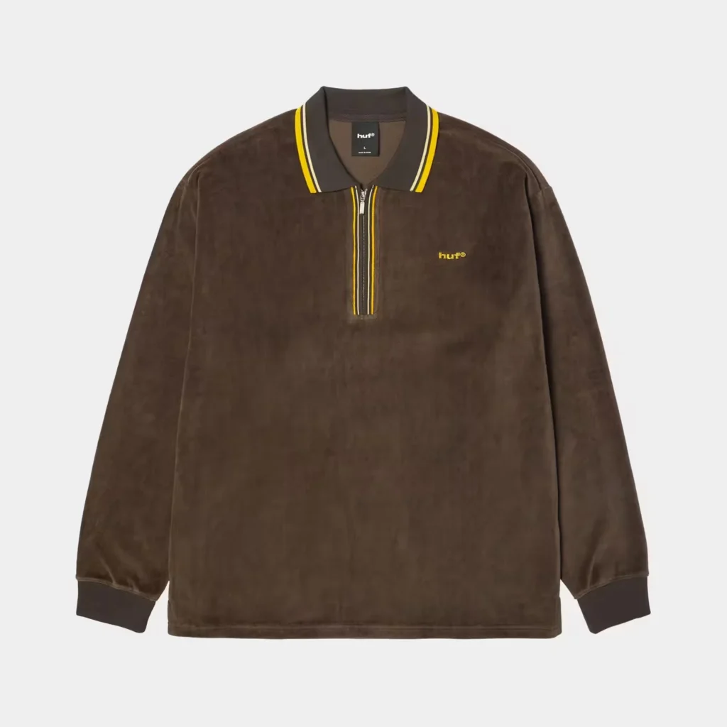 Brown velour long-sleeve pullover with a yellow-striped collar, quarter-zip, cuffs, and HUF logo on a white background