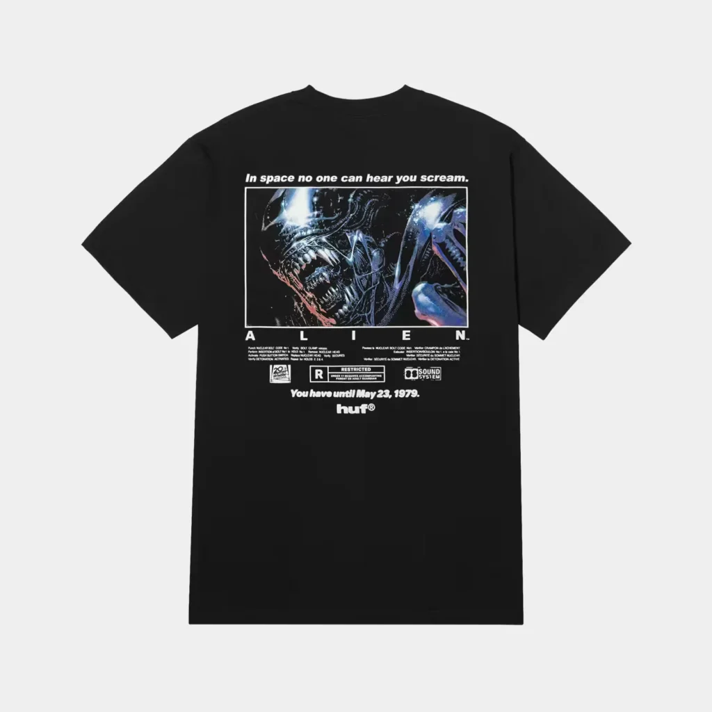 Black T-shirt with a blue-toned Xenomorph film graphic, white text, rating details and HUF logo on a light background