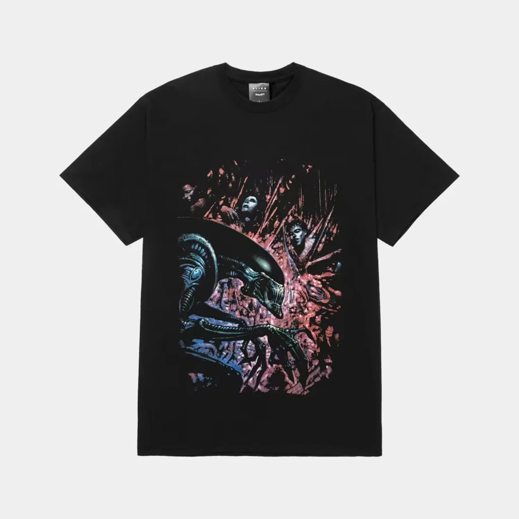 Black HUF T-shirt featuring a colorful Xenomorph and alien artwork across the front, displayed against a light gray
