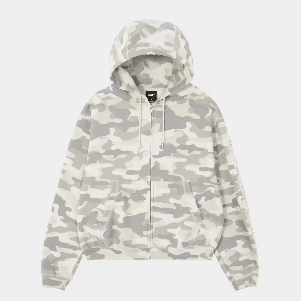 White and gray camouflage zip-up hoodie with drawstrings, hood, and front pockets against a white background