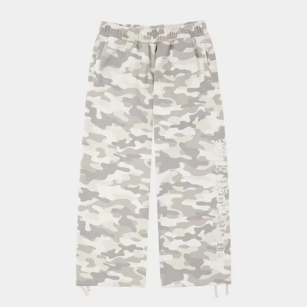 Light gray camouflage shorts with elastic waist, side pockets, drawstrings, and white vertical graphic lettering on one leg
