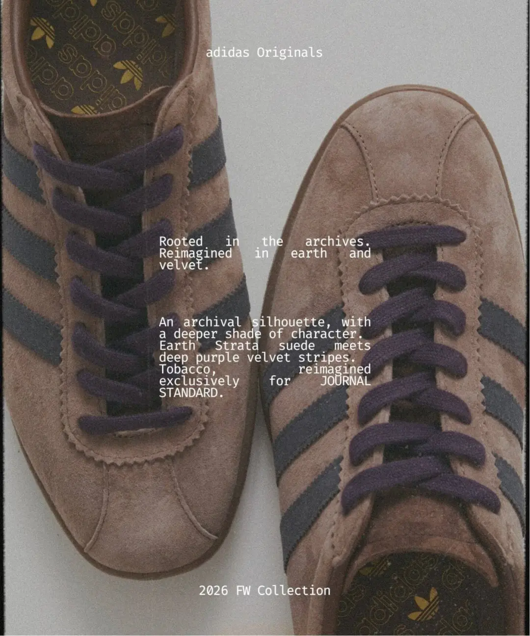 Close-up of two brown suede adidas Tobacco sneakers with dark purple laces and blue-gray stripes on a light background