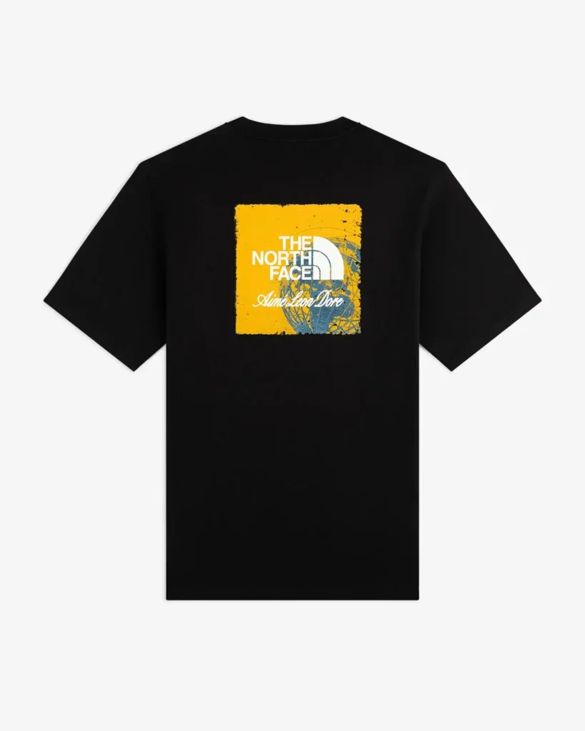 Black T-shirt featuring a yellow and blue The North Face graphic on the chest