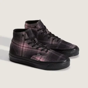 Pair of black-and-pink plaid Vans high-top shoe with black laces and rubber soles on a light background