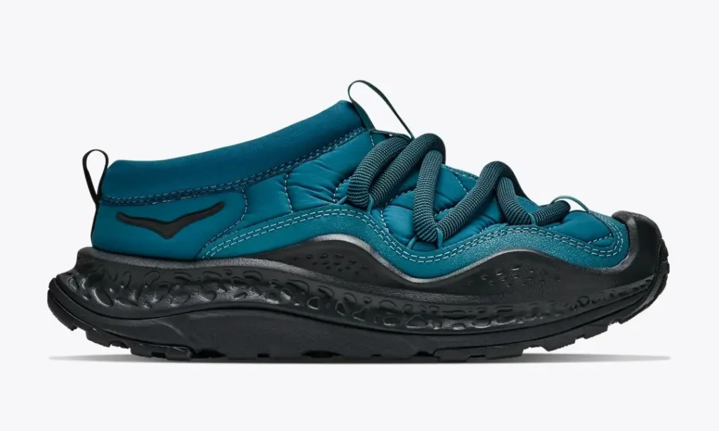 Teal Hoka Ora Primo shoe with black laces, textured black midsole, and rugged outsole on a white background