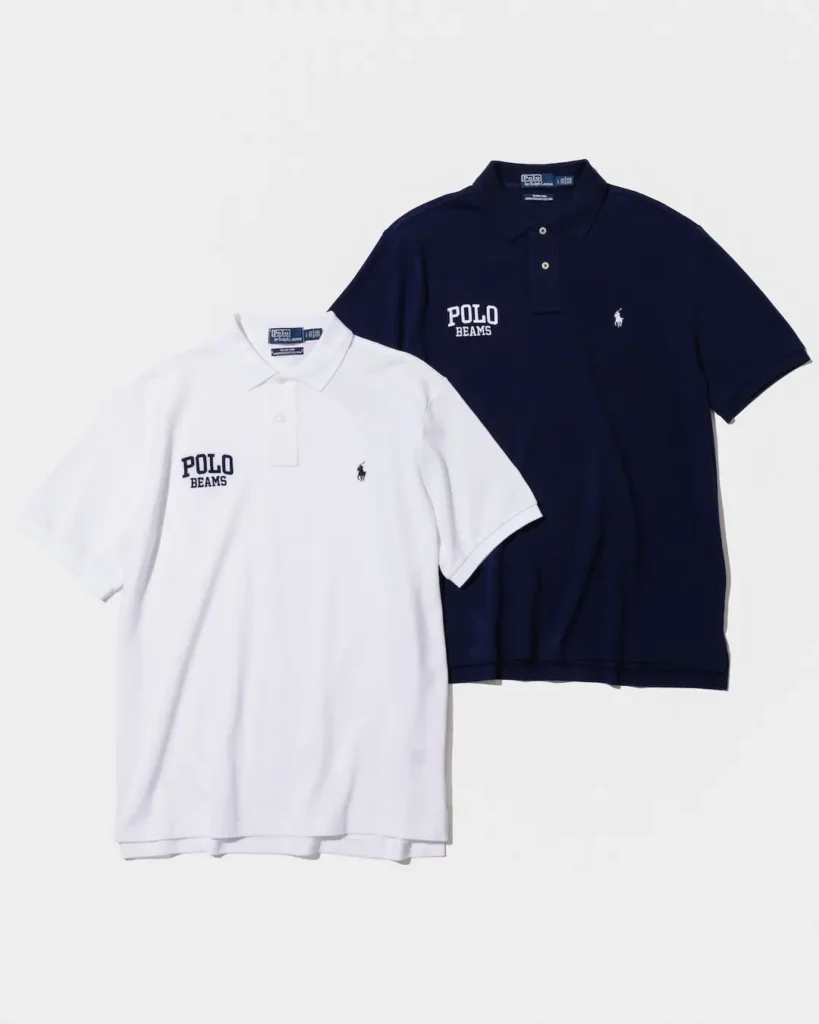 White and navy Polo Beams short-sleeve polo shirts with collars, buttons, chest logos, and horse emblems on a light