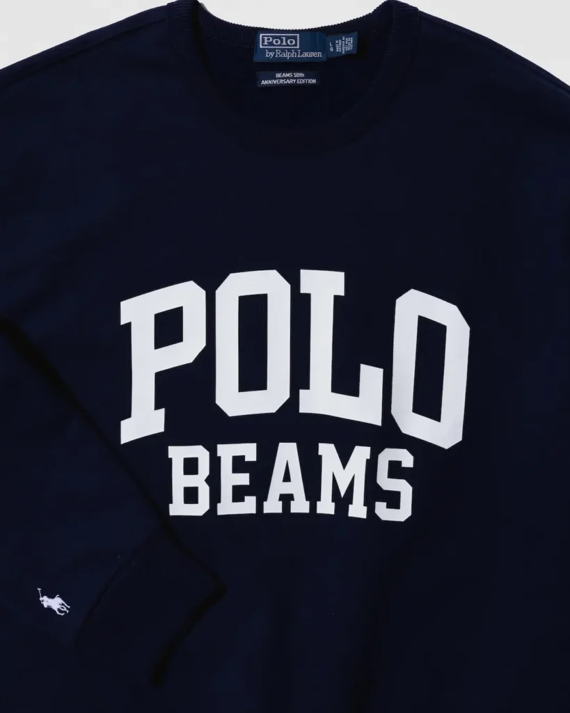 Navy Polo Ralph Lauren sweatshirt with white POLO BEAMS lettering and a small white horse logo, laid flat on white background