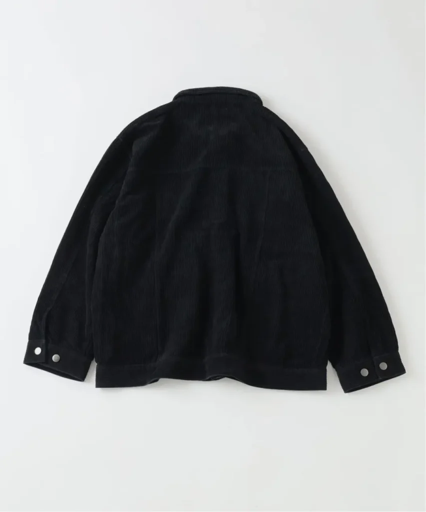 Black corduroy jacket laid flat, showing the back, collar, seams, and silver snap-button cuffs on a white background