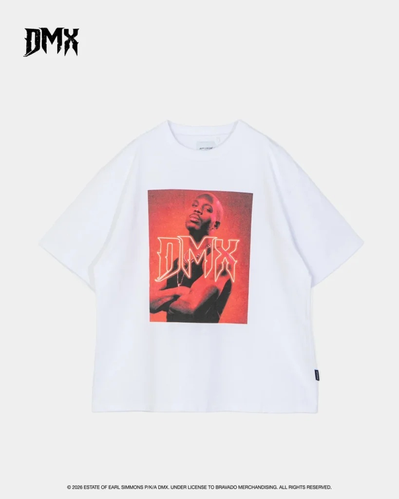 White T-shirt featuring a red portrait graphic of DMX with large outlined lettering, displayed against a light gray
