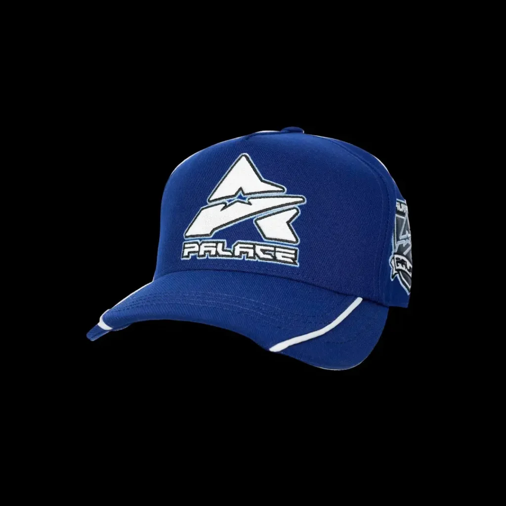 Blue Alpinestars baseball cap with white logo and piping against a black background