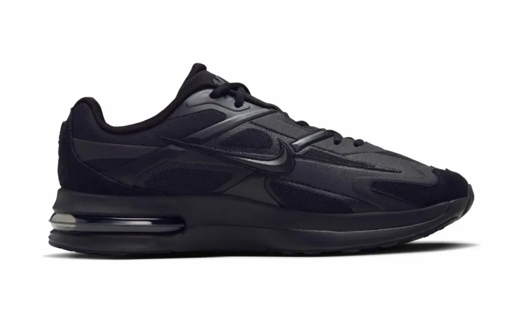 Black Nike Air Max shoe in side profile, featuring mesh panels, layered overlays, laces, and a visible air cushion on
