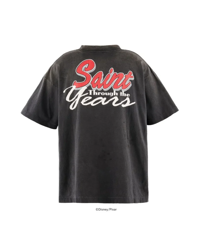Black short-sleeve collared shirt with red and white “Saint Through the Years” lettering, shown against a white background